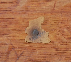 Partial early oval paper label signature.